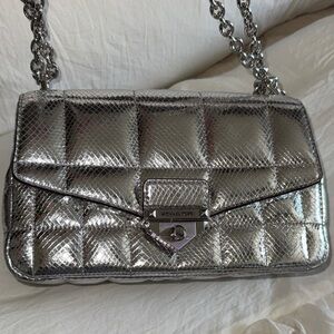 Michael Kors SoHo large quilted metallic snake-embossed leather bag.